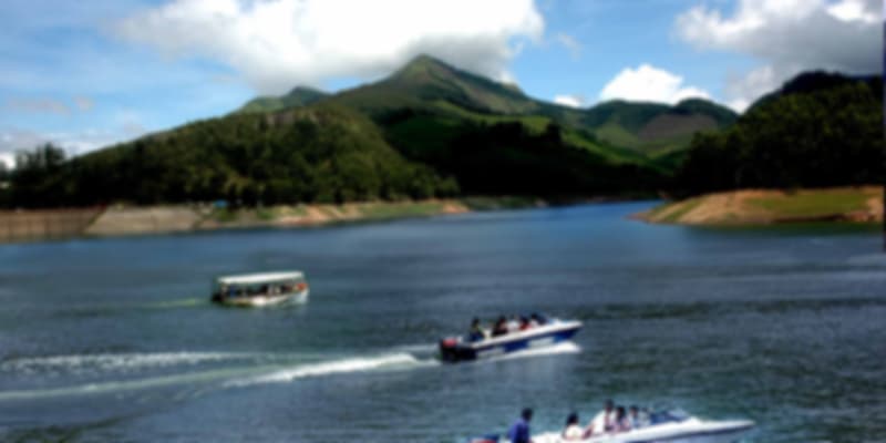 A group of people rafting in Thekkady