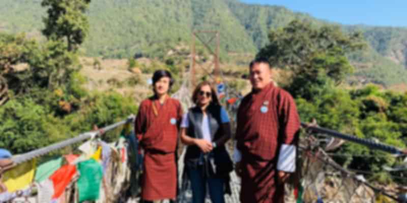 A picture with the localites during my solo trip to Bhutan