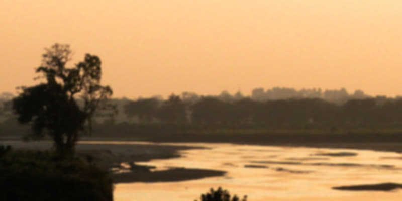 Sunset in Dooars overlooking a river