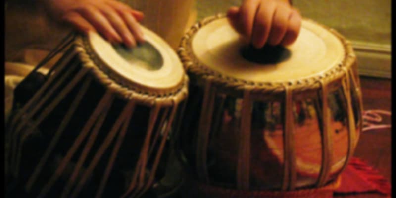 A person playing Tabla
