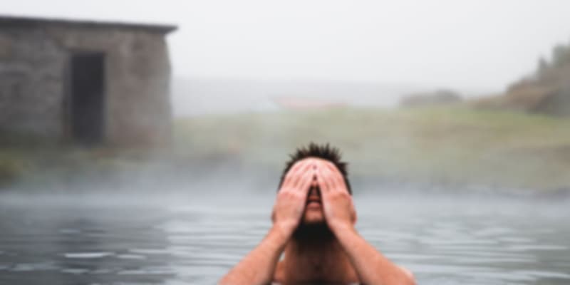 A man relaxing in hot springs