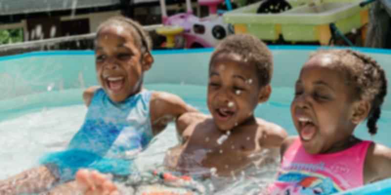 Three kids in a water amusement park