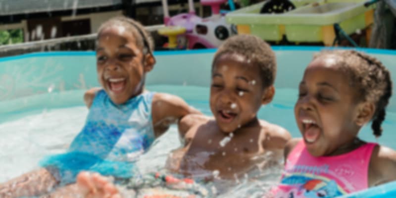 Three kids in a water amusement park