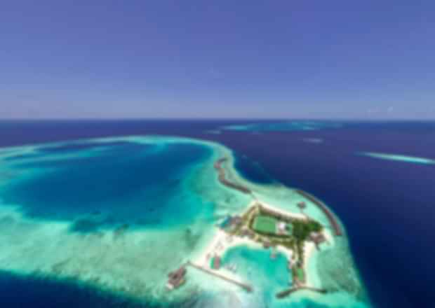 Cinnamon Dhonveli Maldives Resort Guide 2025: Rooms, Surfing, Dining & Travel Tips