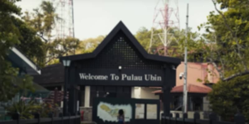 Welcome sign at Pulau Ubin Jetty, the entry point to Singapore’s rustic island known for granite trails and cycling routes