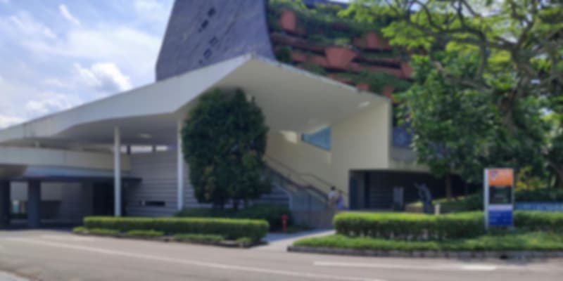 Exterior of Lee Kong Chian Natural History Museum surrounded by greenery