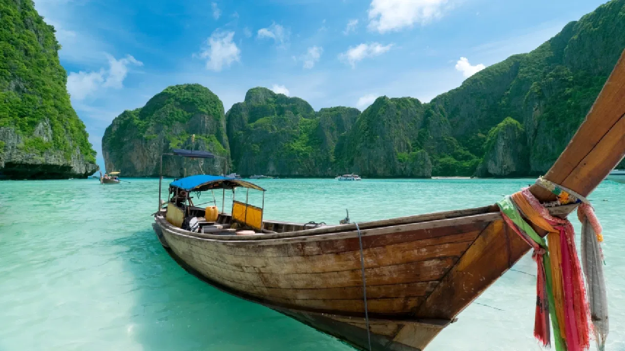A boat in the clear waters of Phuket