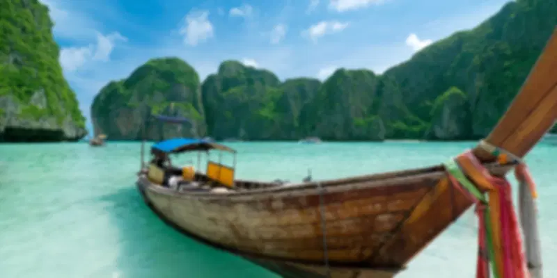 A boat in the clear waters of Phuket