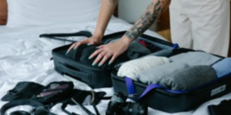 A person packing for trip to Iceland in April