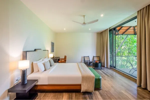 Peaceful room at Anantara Eastern Mangroves Abu Dhabi overlooking lush mangroves and natural surroundings.