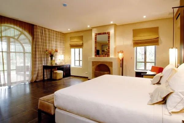 Luxurious guest room at Emirates Palace Abu Dhabi blending Arabian elegance with world-class comfort.