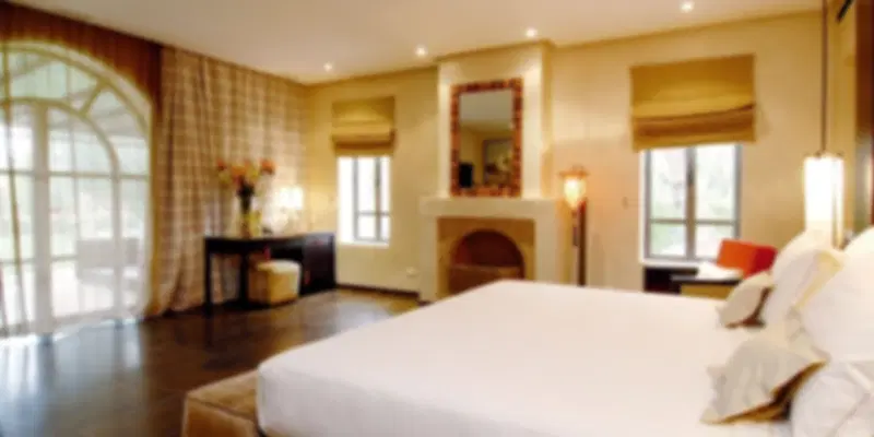 Luxurious guest room at Emirates Palace Abu Dhabi blending Arabian elegance with world-class comfort.