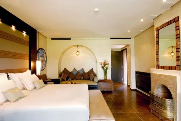 Spacious luxury room at Royal M Hotel by Gewan Abu Dhabi overlooking the Al Bateen Marina.