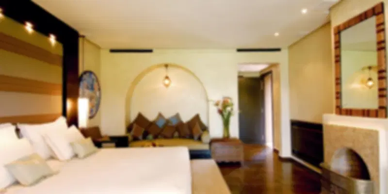 Spacious luxury room at Royal M Hotel by Gewan Abu Dhabi overlooking the Al Bateen Marina.