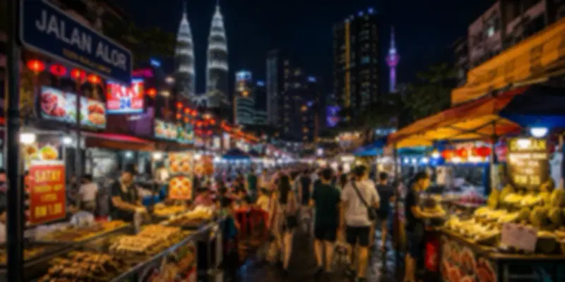 Exploring lively night markets (pasar malam) is an essential part of Kuala Lumpur nightlife.