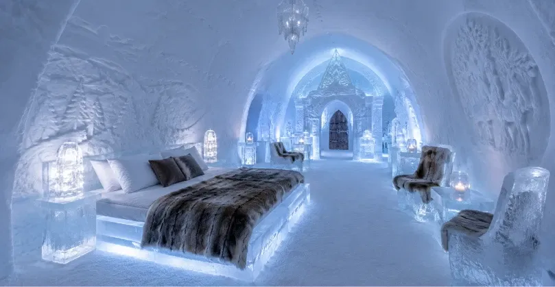 A room set of snow Hotel in Arctic SnowHotel & Glass Igloos